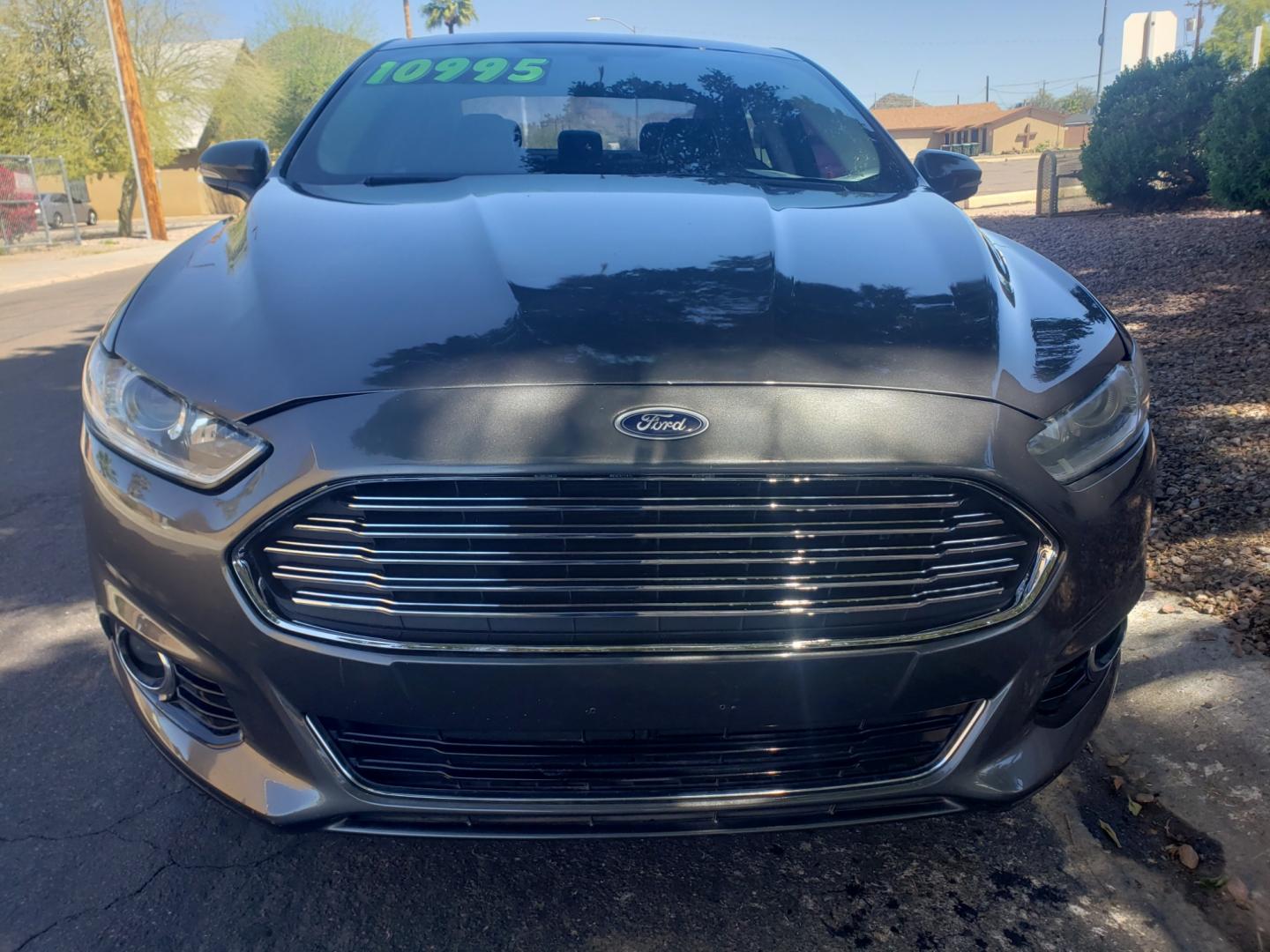 2016 /gray and black Ford Fusion titanium (3FA6P0K99GR) with an 2.0L L4 DOHC 16V engine, 4-Speed Automatic transmission, located at 323 E Dunlap Ave., Phoenix, AZ, 85020, (602) 331-9000, 33.567677, -112.069000 - 2016 Ford Fusion Titanium,......EXCELLENT condition, A Real Must See!!....ONLY 118K MILES,...... No accidents, Power everything, Touch screen Stereo/cd player, Phone sync, Bluetooth, Satellite compatible, Buckup camera, Navigation, Ice cold ac, Clean gray and Black interior with black leather seats - Photo#1